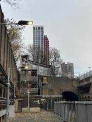 A street light next to a building

AI-generated content may be incorrect.