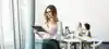businesswoman standing and working on a digital tablet computer in the modern office  