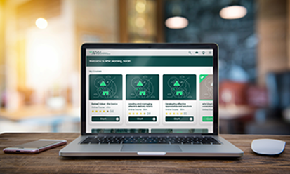 APM Learning dashboard view on a laptop
